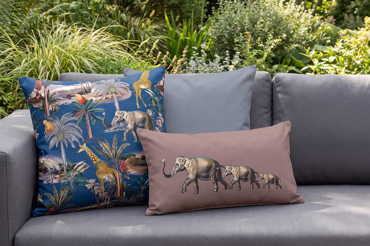 Safari Voyage and Elephants outdoor cushions on a graphite garden sofa
