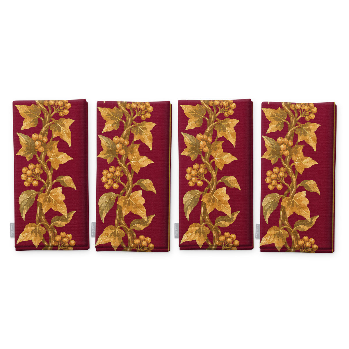 Gilded Ivy Christmas napkins in burgundy and gold, set of four folded napkins showing the same trail of gold ivy and berries