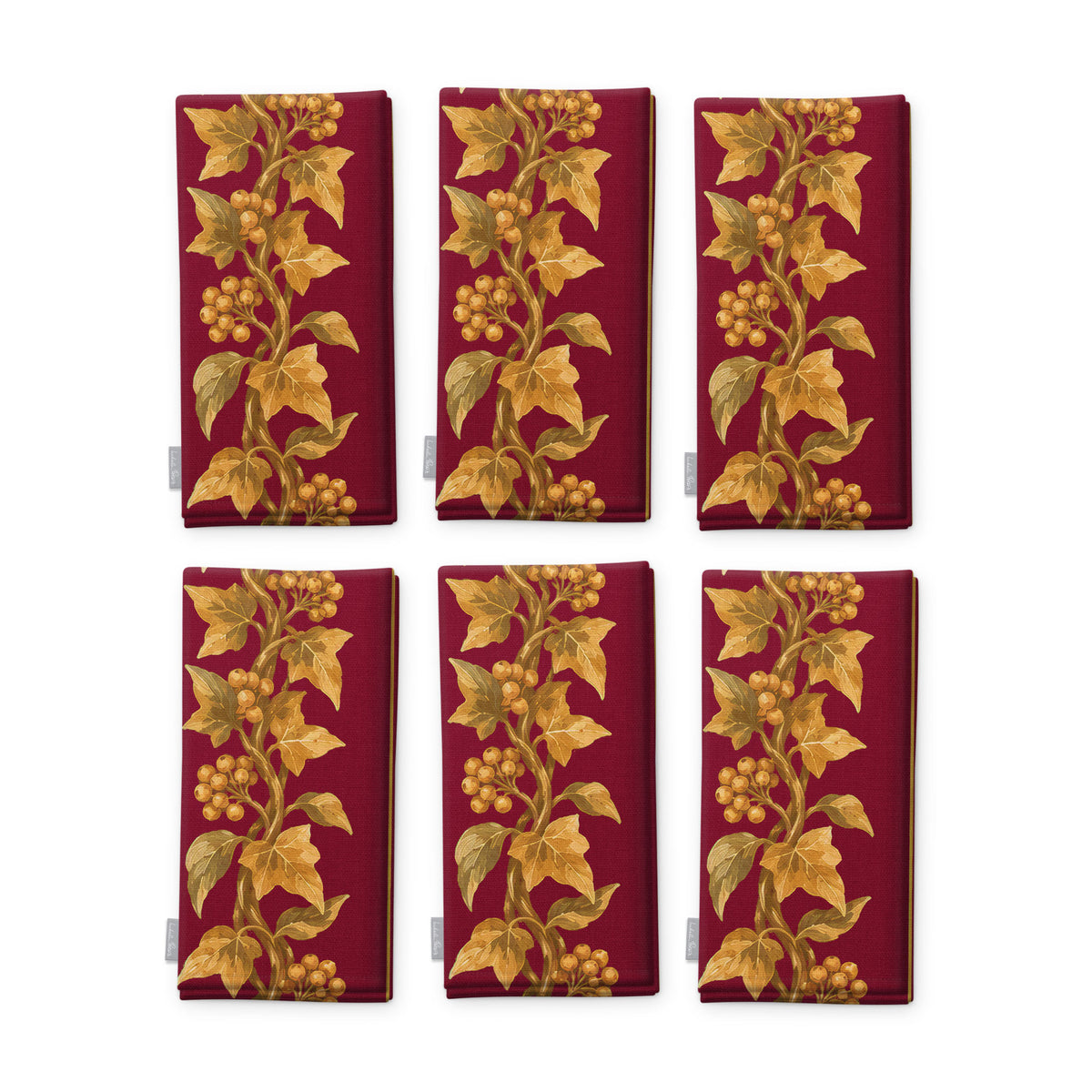 Gilded Ivy Christmas napkins in burgundy and gold, set of six folded napkins showing the same trail of gold ivy and berries