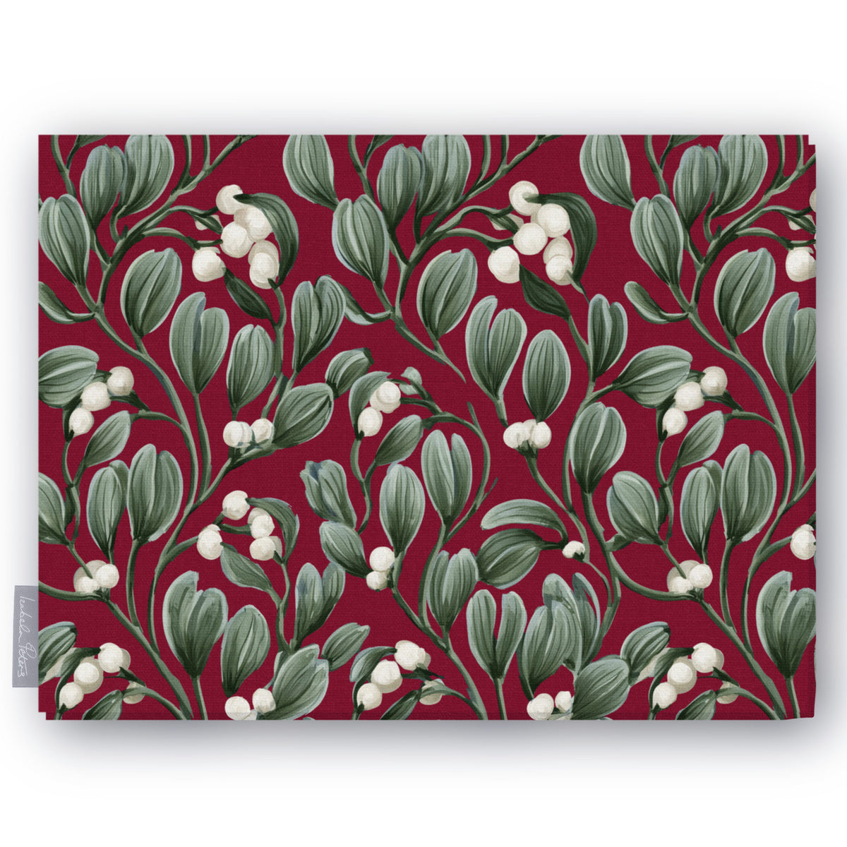 Burgundy Mistletoe Christmas tablecloth folded on white, showing sprigs of mistletoe with white berries