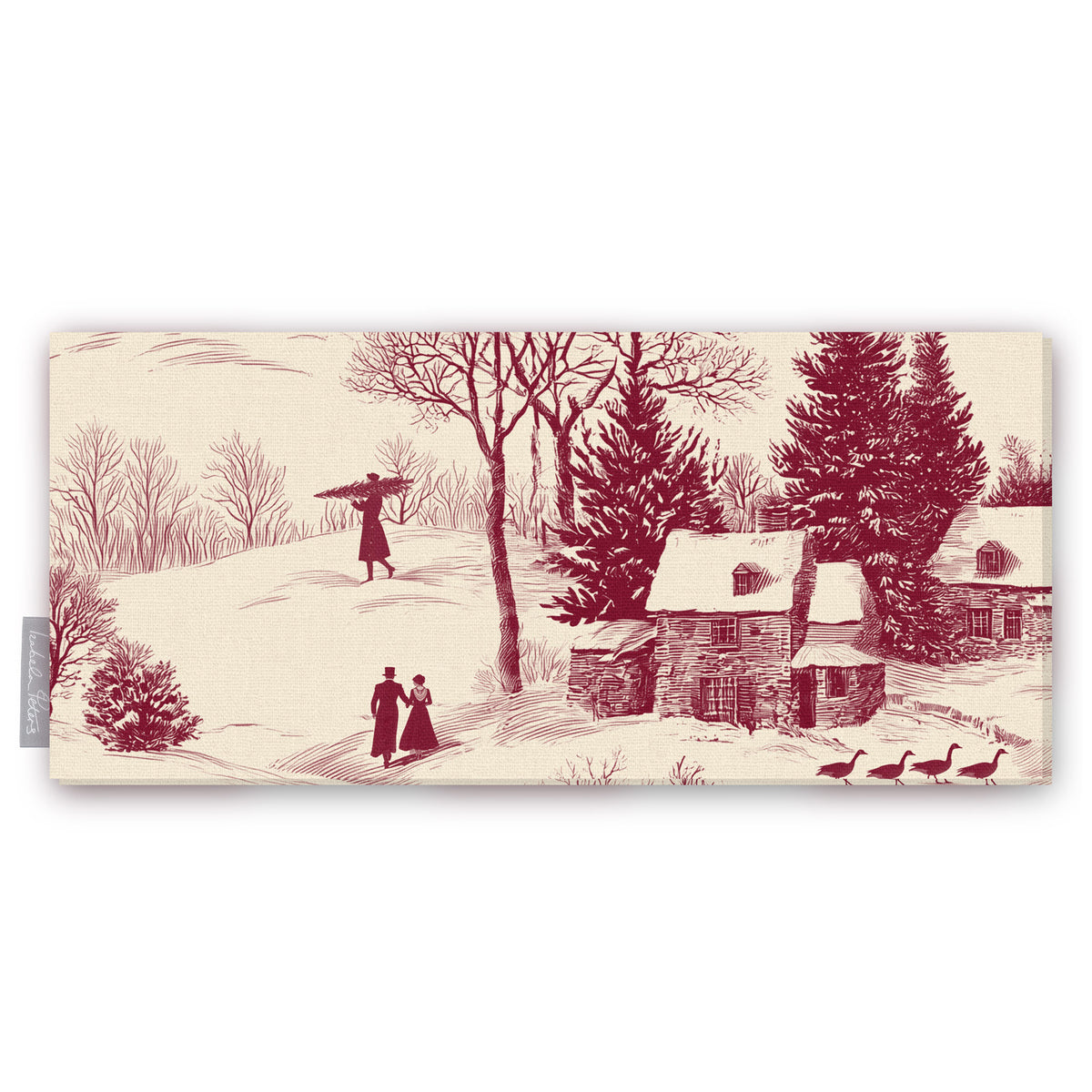 Village Toile Christmas table runner in burgundy on ivory, folded on white, showing villagers and cottages in the snow