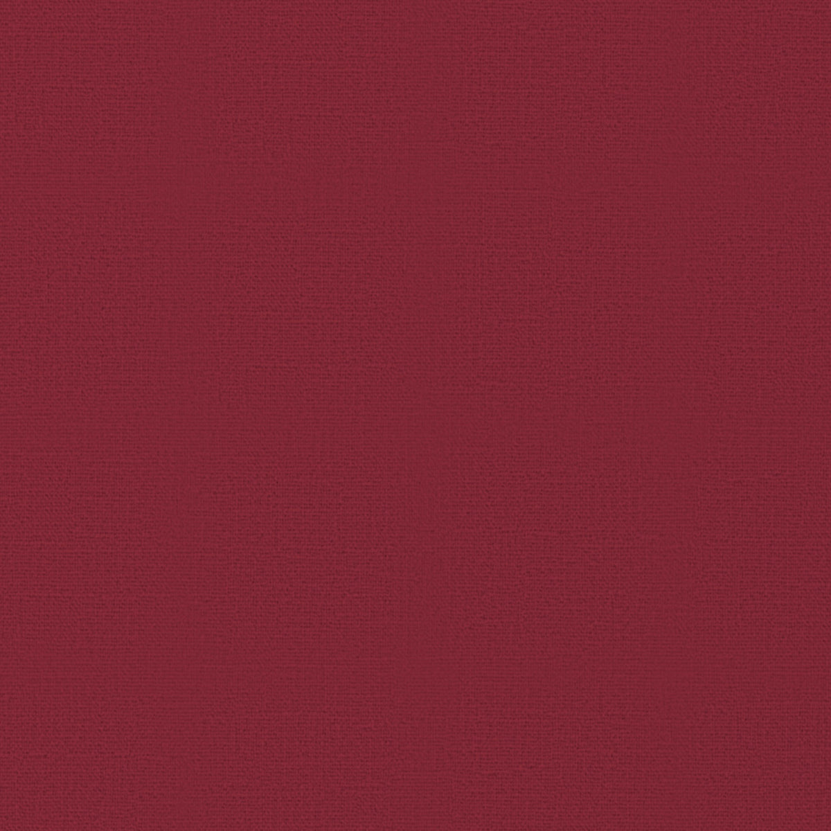 Close-up of the plain burgundy cotton Christmas tablecloth, showing the weave