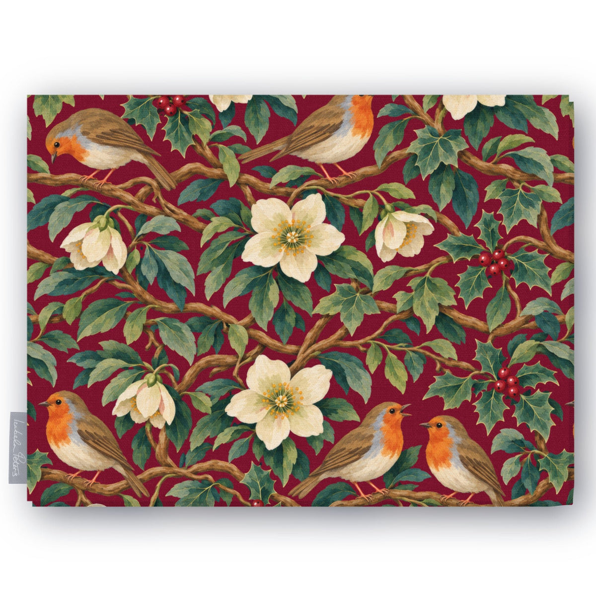 Burgundy Robins and Christmas Roses Christmas tablecloth folded on white, showing robins, Christmas roses and holly
