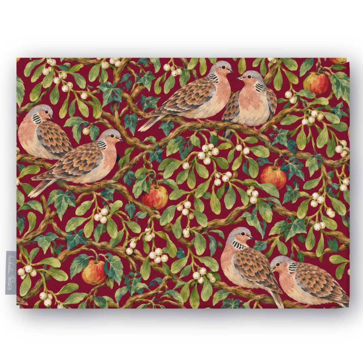 Burgundy Turtle Doves and Mistletoe Christmas tablecloth folded on white, showing turtle doves among mistletoe and red apples