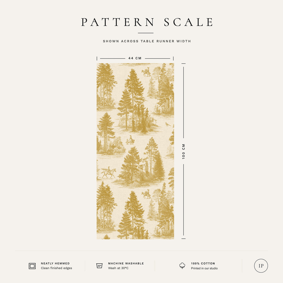 Pattern scale of the Fir Forest Toile Christmas table runner in gold on ivory across its 44 cm width, with care notes