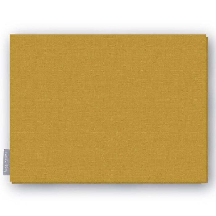 Plain gold cotton Christmas tablecloth folded on white