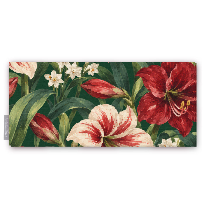 Green Amaryllis Christmas table runner folded on white, showing amaryllis flowers among long leaves