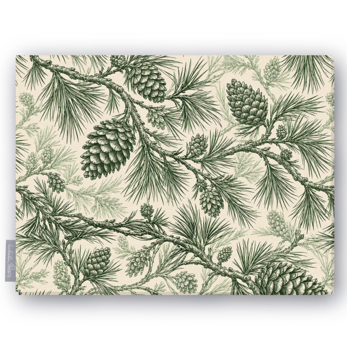 Pine Bough Christmas tablecloth in green on ivory, folded on white, showing pine boughs and cones