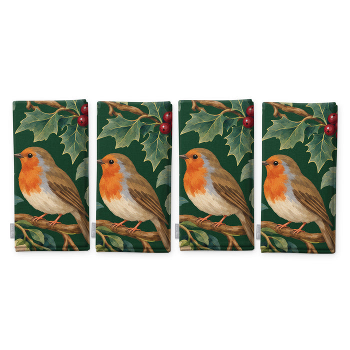 Green Robins and Christmas Roses napkins, set of four, folded on white, showing the same robin under a sprig of holly