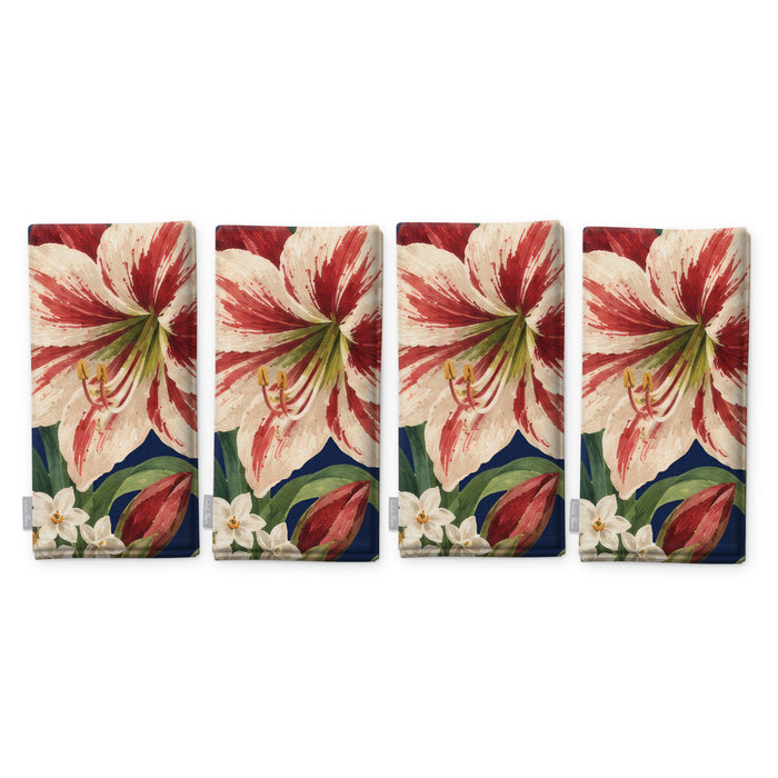 Navy Amaryllis Christmas napkins, set of four, folded on white, showing the same amaryllis flower