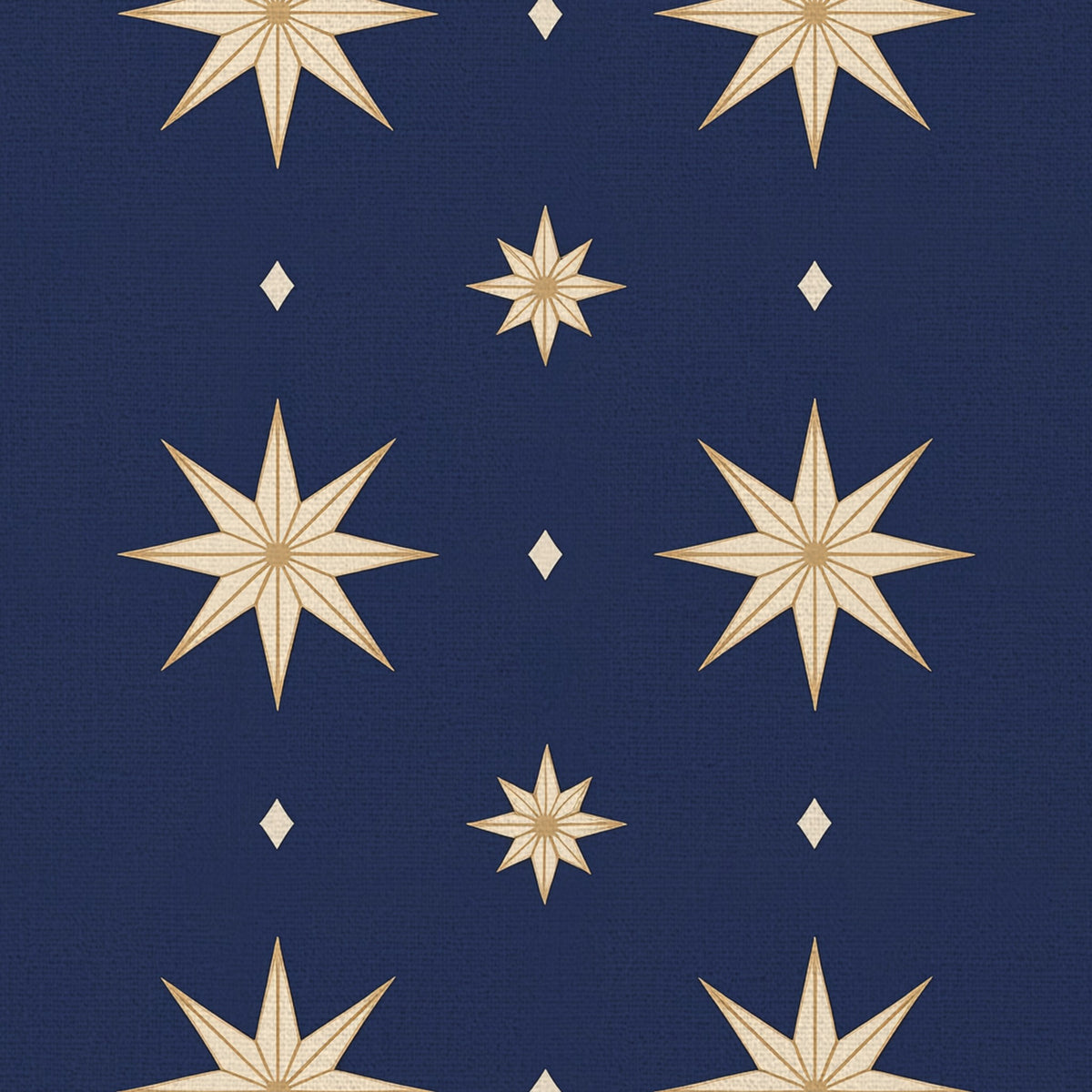 Close-up of the Stars Christmas table runner print in navy and gold on cotton, showing large gold eight-pointed stars