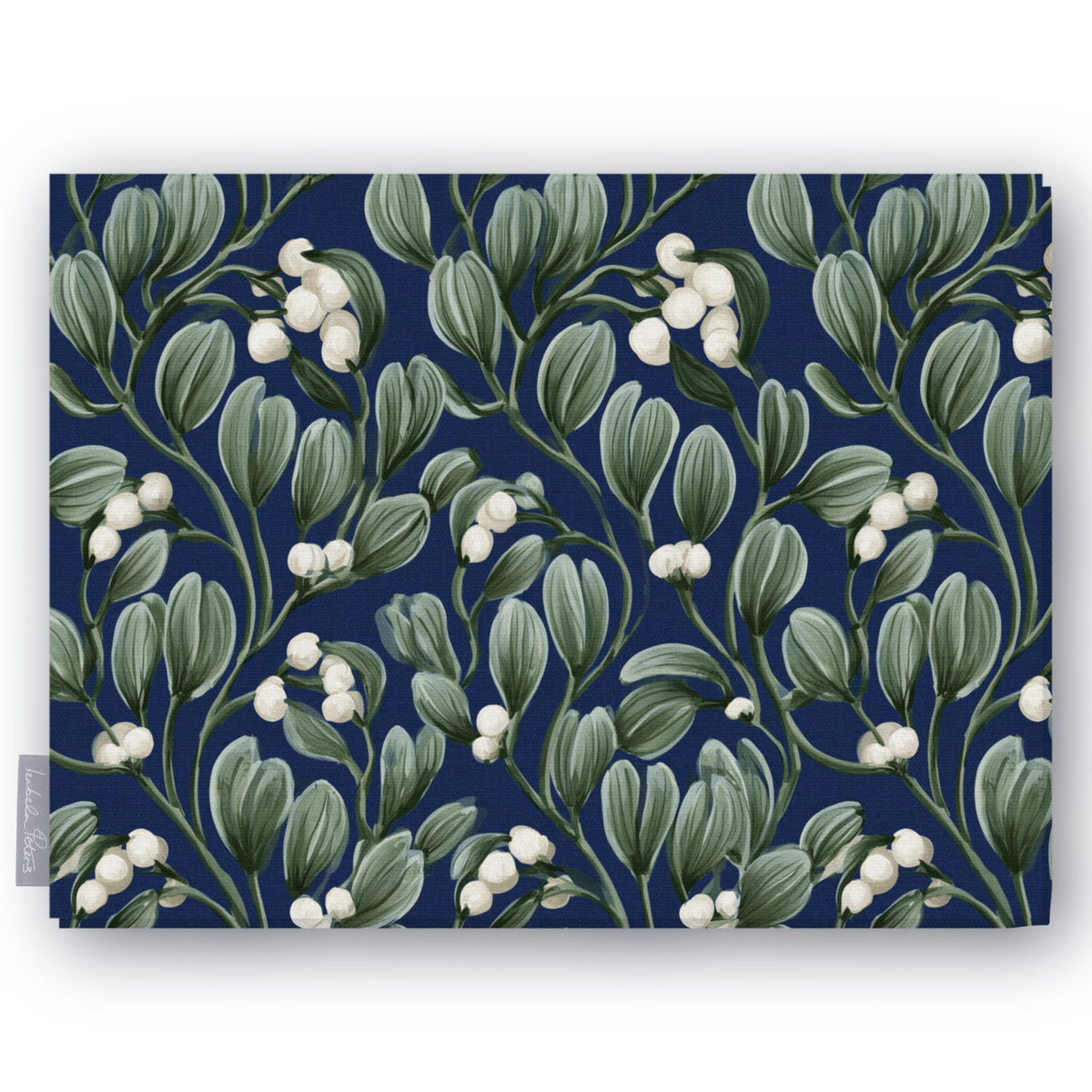Navy Mistletoe Christmas tablecloth folded on white, showing sprigs of mistletoe with white berries