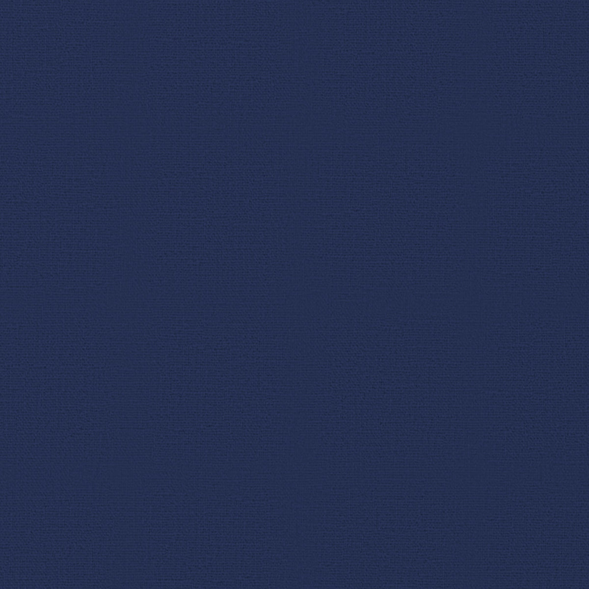 Close-up of the plain navy cotton Christmas tablecloth, showing the weave