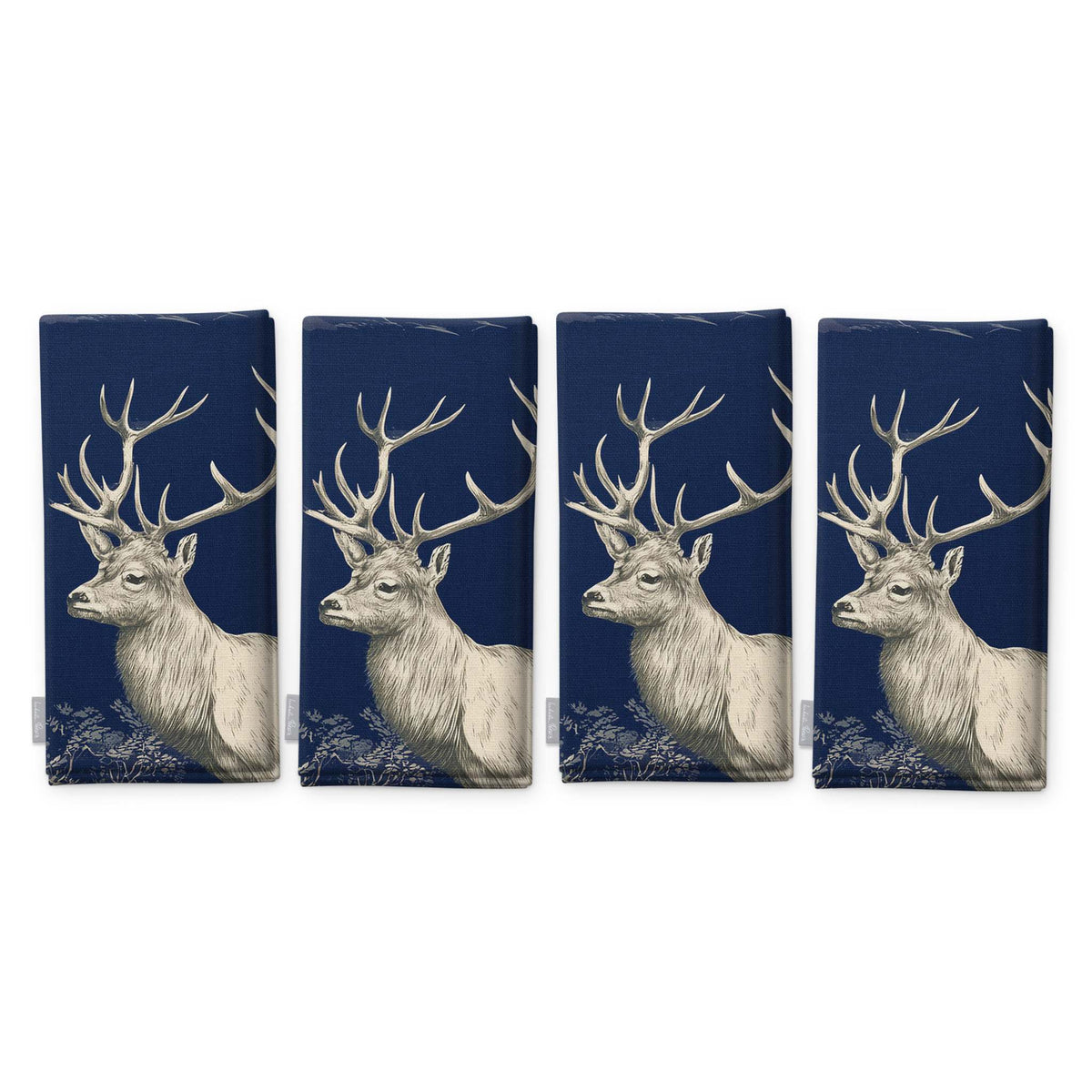 Navy Stag Woodland Christmas napkins, set of four, folded on white, showing the same stag head