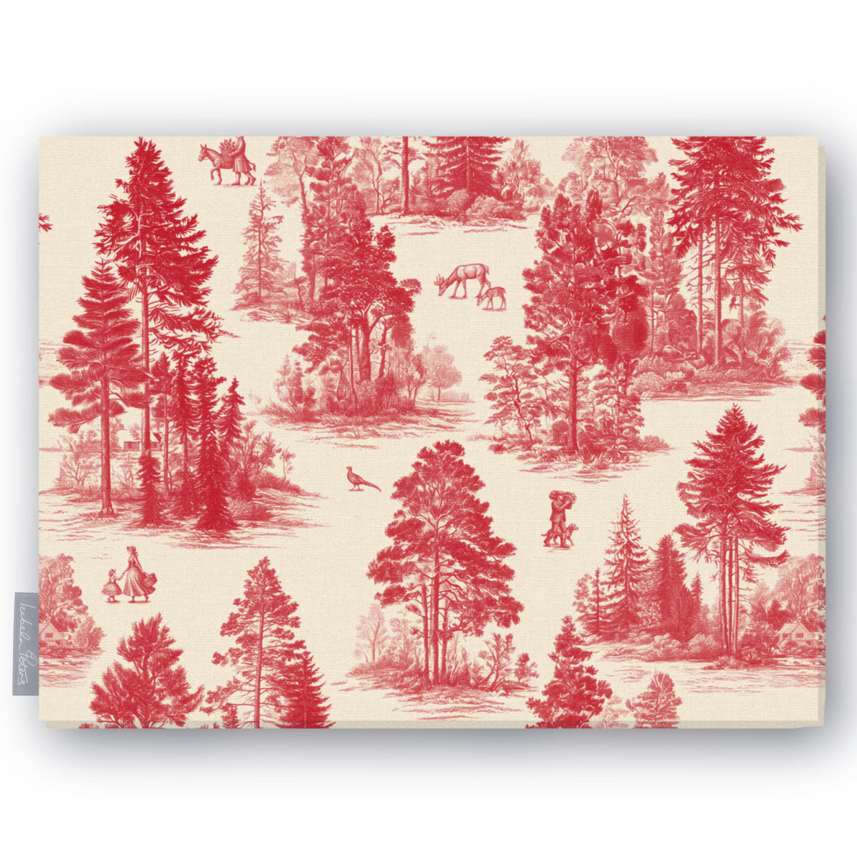 Fir Forest Toile Christmas tablecloth in red on ivory, folded on white, showing fir trees, a rider and figures in the forest