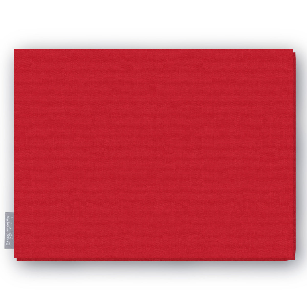 Plain red cotton Christmas tablecloth folded on white