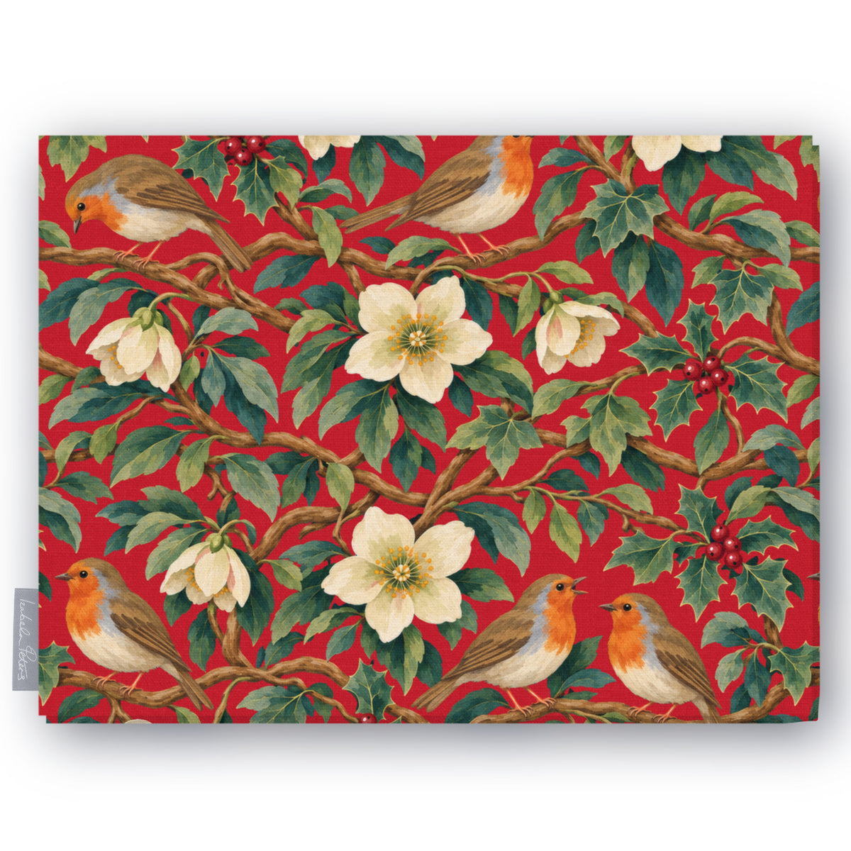 Red Robins and Christmas Roses Christmas tablecloth folded on white, showing robins, Christmas roses and holly