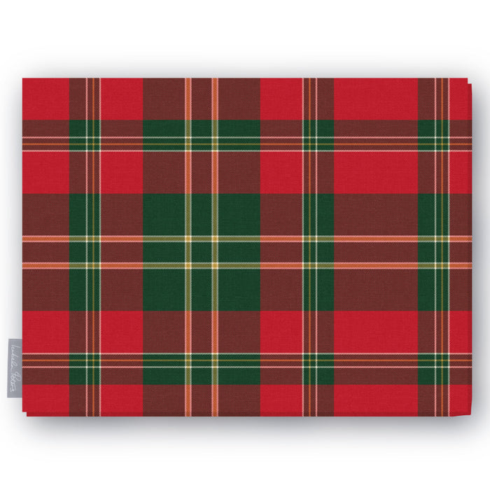 Red tartan Christmas tablecloth folded on a white background, red and deep green with fine ivory and gold lines