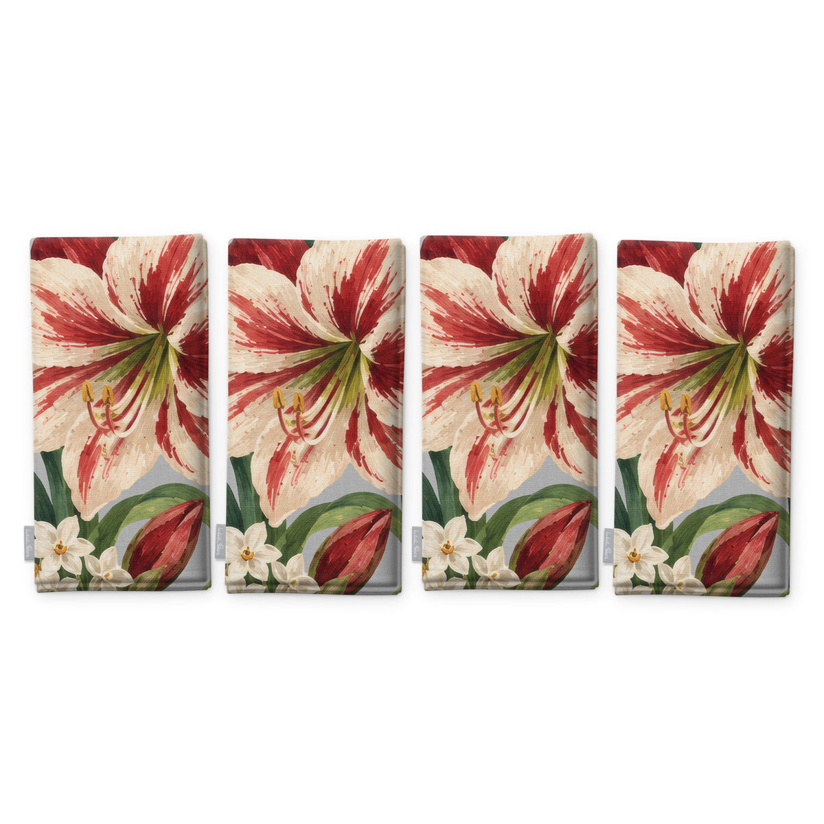 Amaryllis Christmas napkins in silver grey, set of four, folded on white, showing the same amaryllis flower