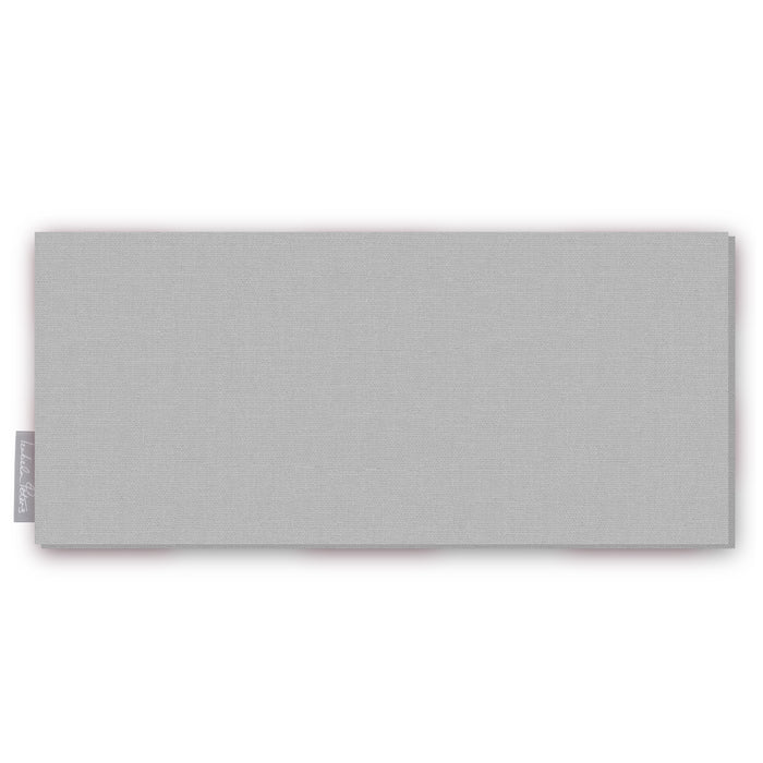Plain silver cotton Christmas table runner folded on white