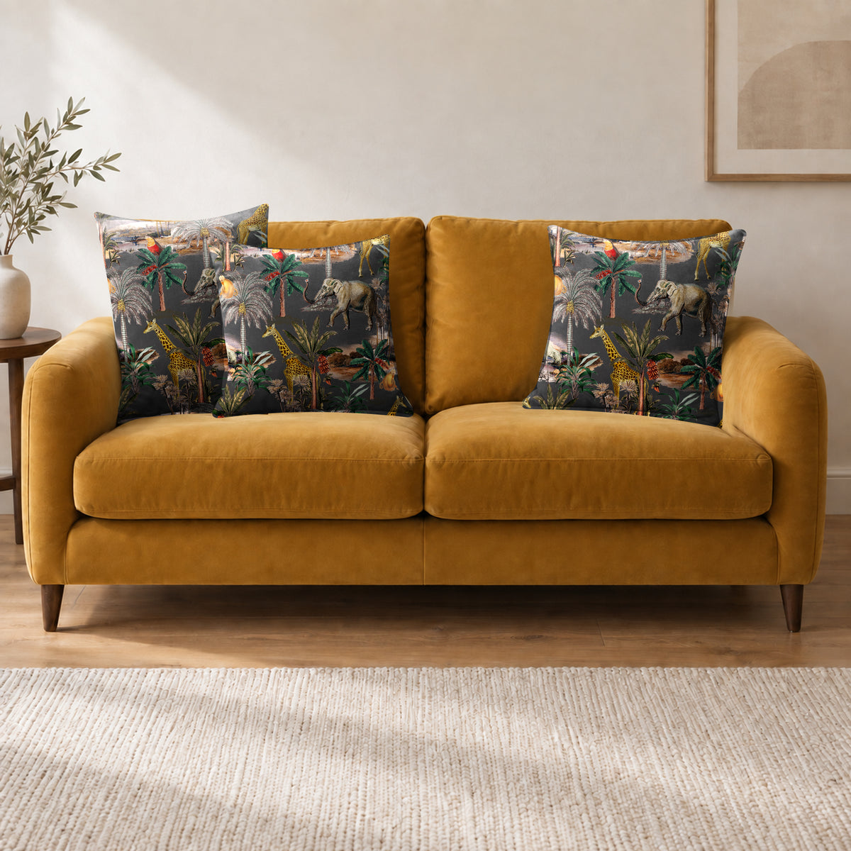 Safari Voyage cushion in Graphite on a sofa