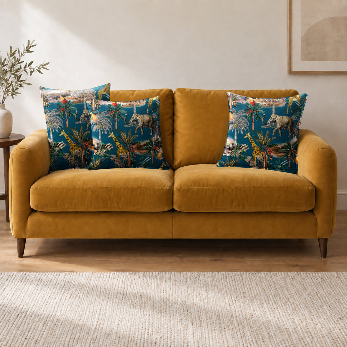 Safari Voyage cushion in Teal on a sofa