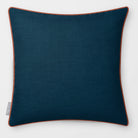 Avara Plain Teal & Persimmon linen-look square cushion, piped, front view.