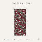 Pattern scale of the Mistletoe Christmas table runner in burgundy across its 44 cm width, with care notes