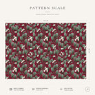 Pattern scale of the Mistletoe Christmas tablecloth in burgundy across its 144 cm width, with care notes