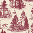 Close-up of the Fir Forest Toile Christmas table runner print in burgundy on ivory cotton, showing fir trees and a rider