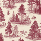 Close-up of the Fir Forest Toile Christmas tablecloth print in burgundy on ivory cotton, showing fir trees and a rider