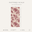Pattern scale of the Pine Bough Christmas table runner in burgundy on ivory across its 44 cm width, with care notes