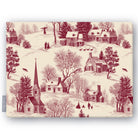 Village Toile Christmas tablecloth in burgundy on ivory, folded on white, showing a snowy village with a church and cottages