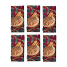 Burgundy Partridge and Pear Christmas napkins, set of six, folded on white, showing the same partridge among pears