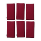 Plain burgundy cotton Christmas napkins, set of six, folded on white