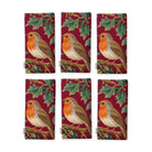 Burgundy Robins and Christmas Roses napkins, set of six, folded on white, showing the same robin under a sprig of holly