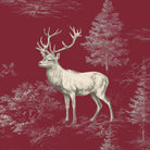 Close-up of the burgundy Stag Woodland Christmas napkin print on cotton, showing stags among woodland trees