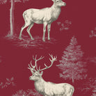 Close-up of the burgundy Stag Woodland Christmas table runner print on cotton, showing stags among woodland trees
