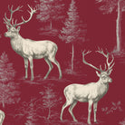 Close-up of the burgundy Stag Woodland Christmas tablecloth print on cotton, showing stags among woodland trees