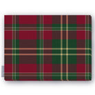 Burgundy tartan Christmas tablecloth folded on a white background, burgundy and deep green with fine ivory and gold lines