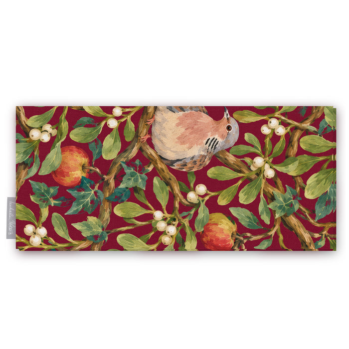 Burgundy Turtle Doves and Mistletoe table runner folded on white, showing a turtle dove among mistletoe and red apples