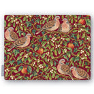 Burgundy Turtle Doves and Mistletoe Christmas tablecloth folded on white, showing turtle doves among mistletoe and red apples