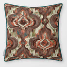 Front view of a Court Medallion Repeat square cushion in Cocoa & Teal, finished with Deep Teal piping.