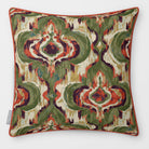 Front view of a Court Medallion Repeat square cushion in Olive & Tomato, finished with Tomato piping.