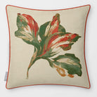 Fiora Floral Olive & Tomato linen-look square cushion, piped, front view.