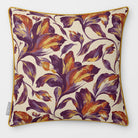 Front view of a Fiora Floral Repeat square cushion in Plum & Saffron, finished with Saffron piping.