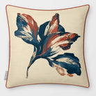 Fiora Floral Teal & Persimmon linen-look square cushion, piped, front view.
