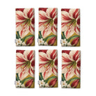Gold Amaryllis Christmas napkins, set of six, folded on white, showing the same amaryllis flower