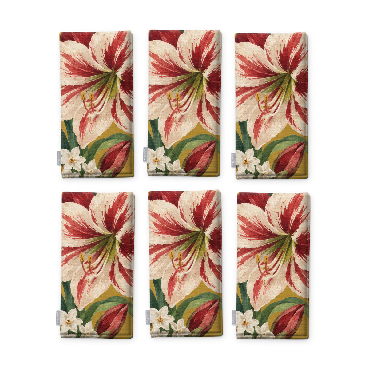 Gold Amaryllis Christmas napkins, set of six, folded on white, showing the same amaryllis flower