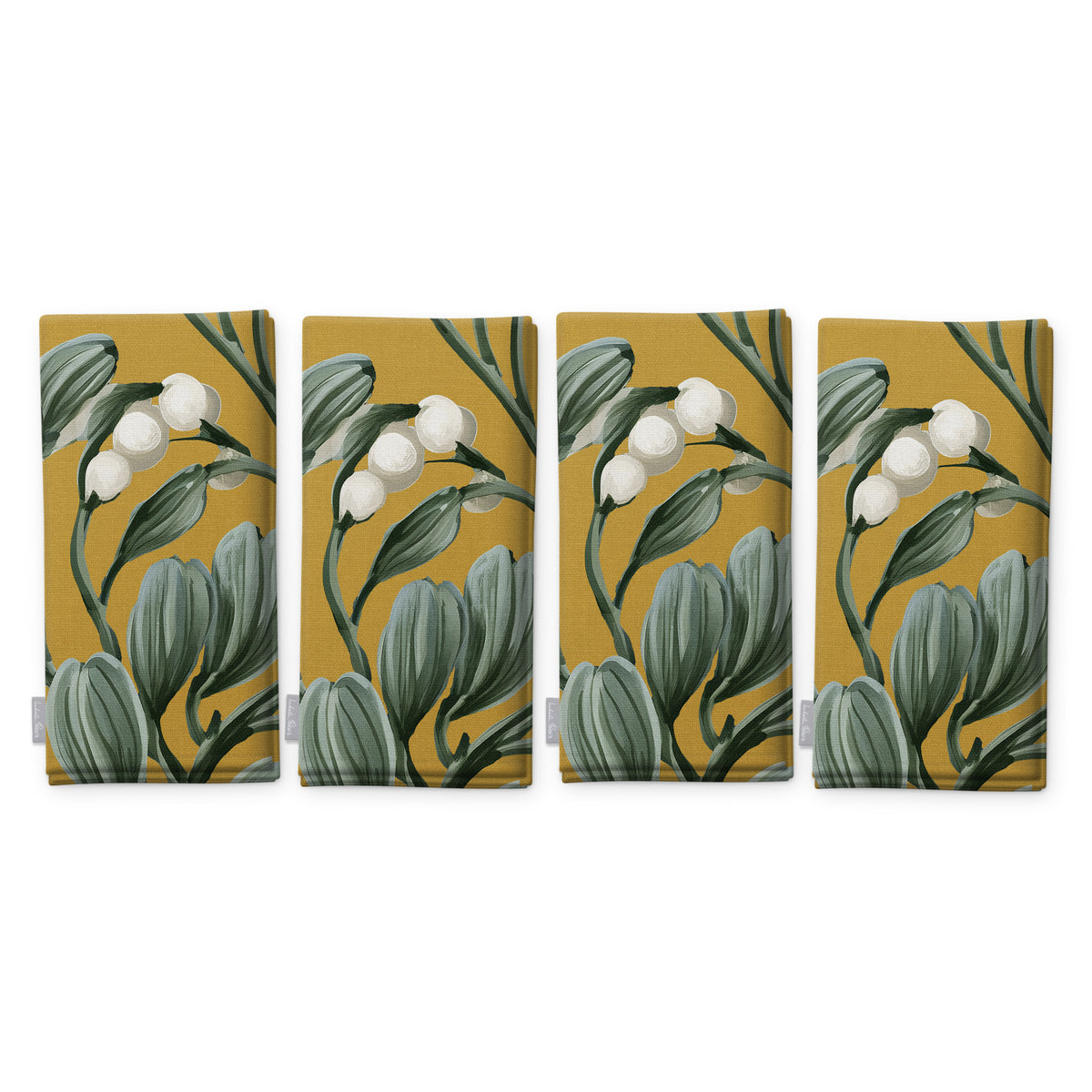 Gold Mistletoe Christmas napkins, set of four, folded on white, showing the same sprig of mistletoe with white berries